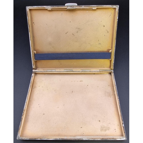 614 - A distinguished silver cigarette case. Hallmarked Birmingham 1920, by 'Kirwan & Co'. Weight approx. ... 