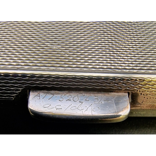 614 - A distinguished silver cigarette case. Hallmarked Birmingham 1920, by 'Kirwan & Co'. Weight approx. ... 