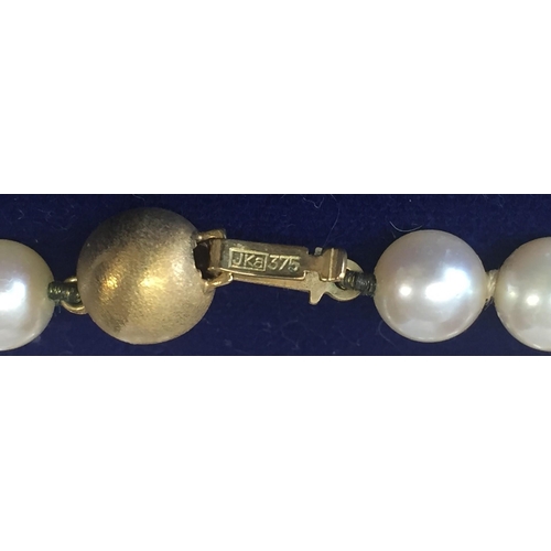 633 - A 9ct gold & pearl necklace, together with a pair of 9ct gold & pearl earrings. Combined weight appr... 