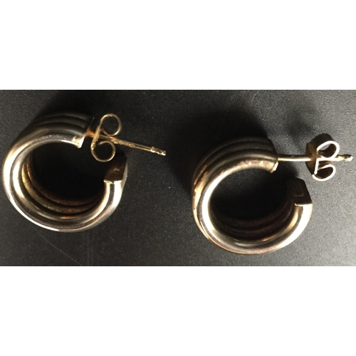 641 - A hallmarked 9K Italian gold, triple-hoop design pair of earrings. Weight approx. 5g.