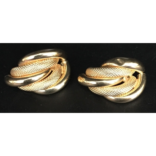 649 - A hallmarked 18ct gold, interlocking hoop/alternating pattern design, pair of earrings. Weight appro... 