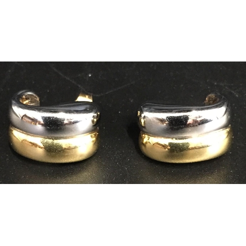 650 - A hallmarked 18ct gold, double-hoop design pair of earrings. Weight approx. 3.2g.