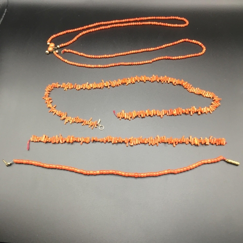 668 - A collection of costume necklaces & bracelet. To include a Coral example.