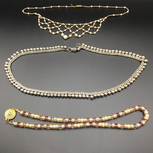 668 - A collection of costume necklaces & bracelet. To include a Coral example.