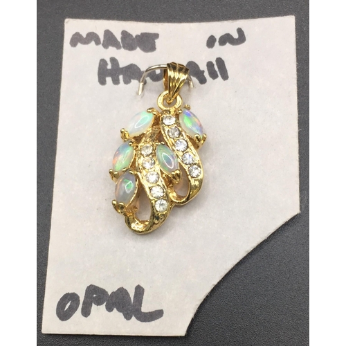 672 - A boxed yellow metal opal ring, size O, a gold-plated silver Australian opal brooch & a pretty Hawai... 