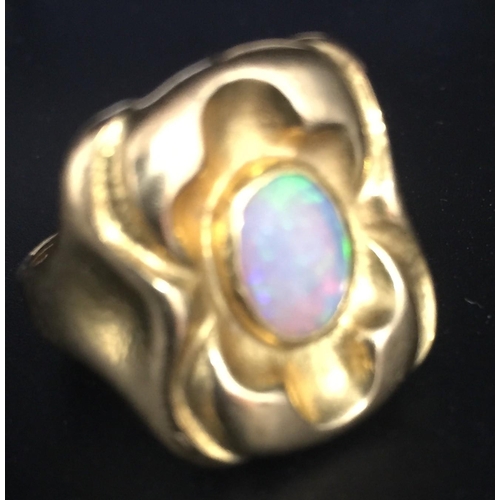 672 - A boxed yellow metal opal ring, size O, a gold-plated silver Australian opal brooch & a pretty Hawai... 