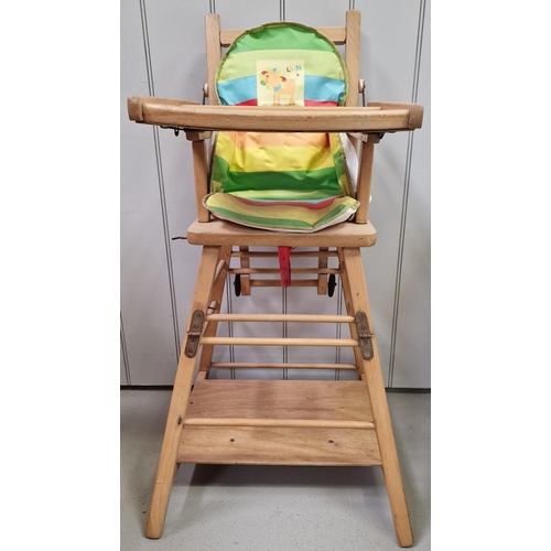 743 - A beech, doll's highchair. Dimensions(cm) H98, W51, D51.