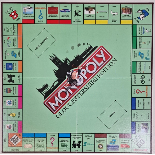 744 - A boxed 'Gloucestershire - Edition' Monopoly game. Unchecked for completeness,