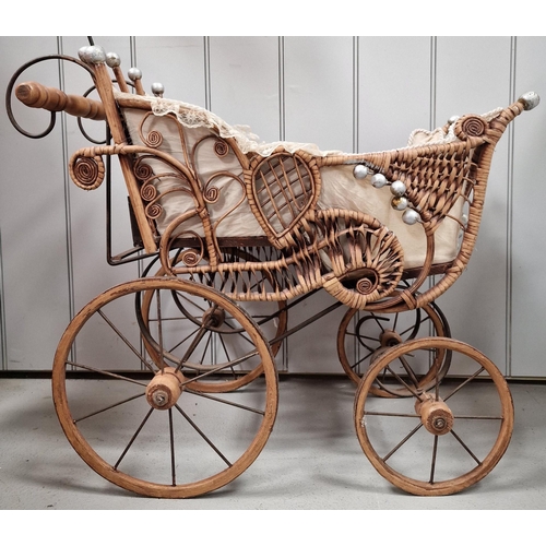 745 - A vintage, Victorian-style wicker & iron doll's pram, with parasol. Overall dimensions with parasol(... 