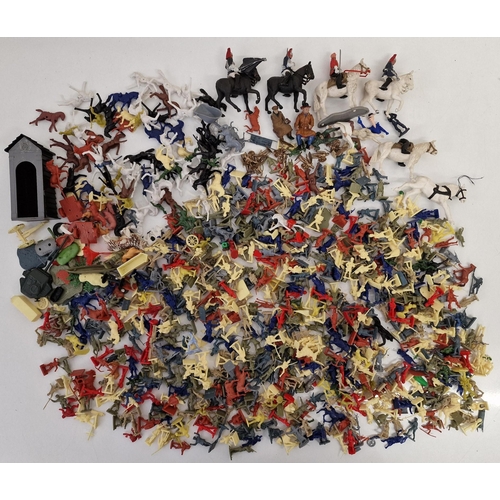 824 - A massive collection of vintage, plastic toy soldiers & Cowboys & Indians.