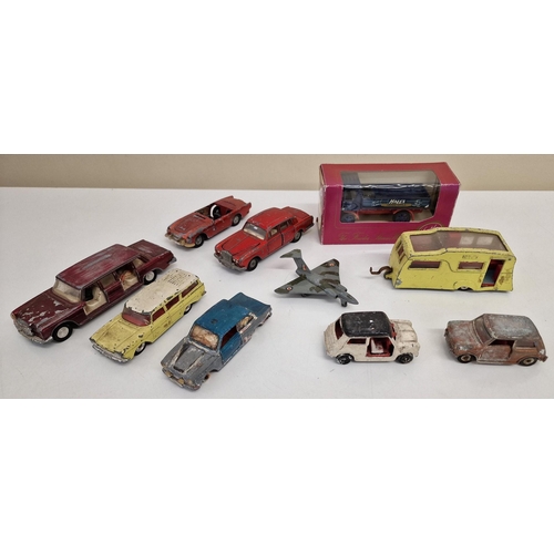 849 - A collection of nine playworn Dinky diecast vehicles, together with a boxed, limited edition Hall's ... 