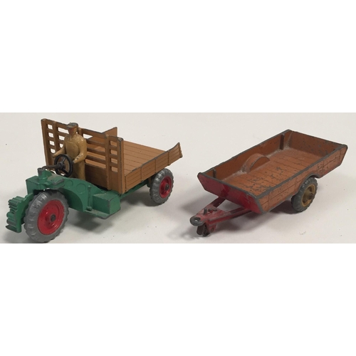 858 - An unboxed & play worn Dinky Motorcart & Farm Trailer