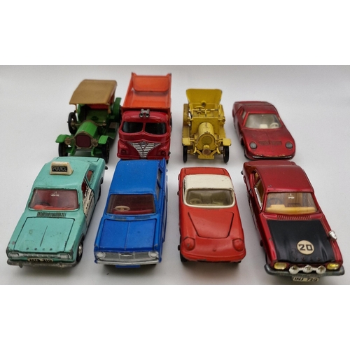 859 - A mixed lot of eight playworn diecast vehicles. All unboxed except Dinky 213 Ford Capri Rally Car, w... 