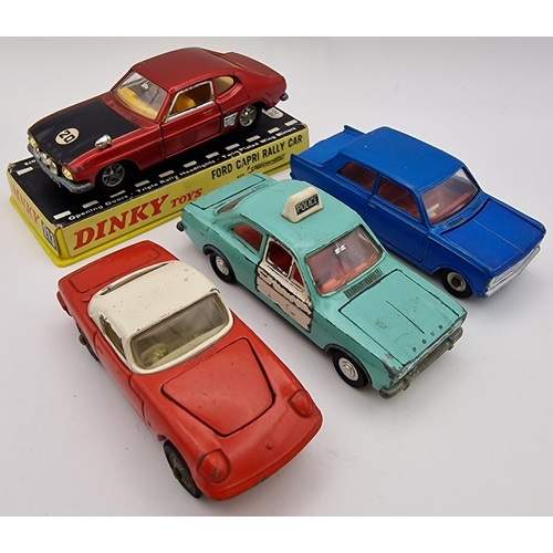 859 - A mixed lot of eight playworn diecast vehicles. All unboxed except Dinky 213 Ford Capri Rally Car, w... 