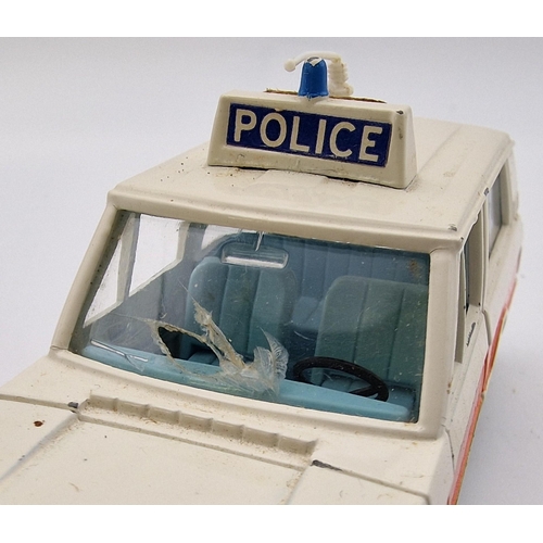 865 - A duo of original, boxed 'Dinky models - Fire Chief's Car & Police Patrol Range Rover', model no's 1... 