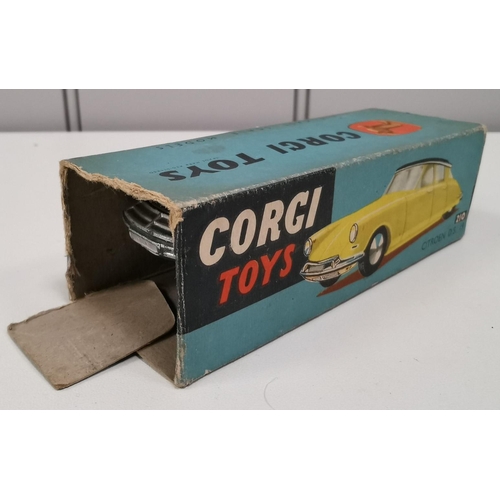 877 - Corgi 210 - Citroen DS19, in metallic green. Complete with original early box (one end flaps missing... 