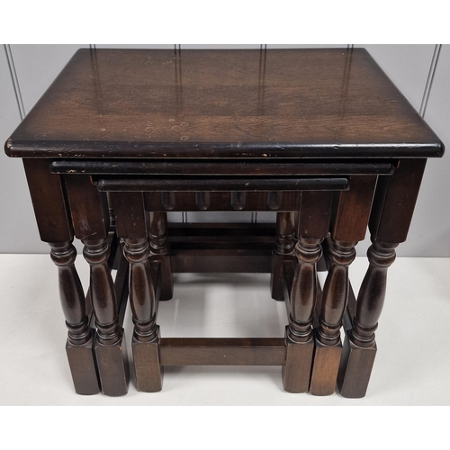 6 - A vintage, oak nest of three tables. Largest dimensions(cm) H47, W51, D39.