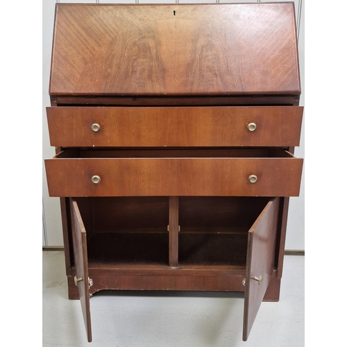 87 - A vintage bureau. Fall-front, over twin drawers & double cupboard area. Dimensions(cm) H100, W75, D3... 