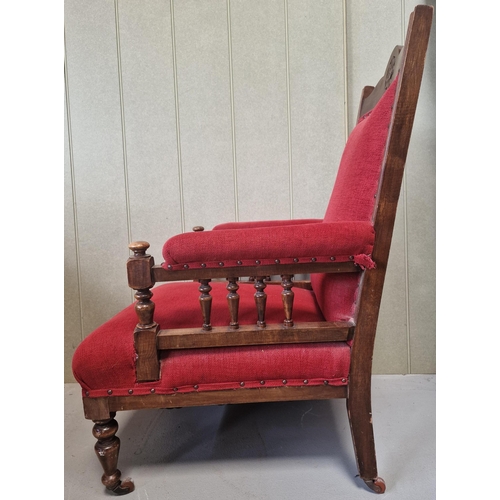 96 - An Edwardian Lounge Chair. Oak framed with a vibrant red fabric upholstery. Dimensions(cm) H102(37 t... 