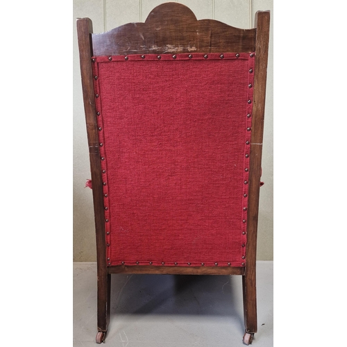 96 - An Edwardian Lounge Chair. Oak framed with a vibrant red fabric upholstery. Dimensions(cm) H102(37 t... 