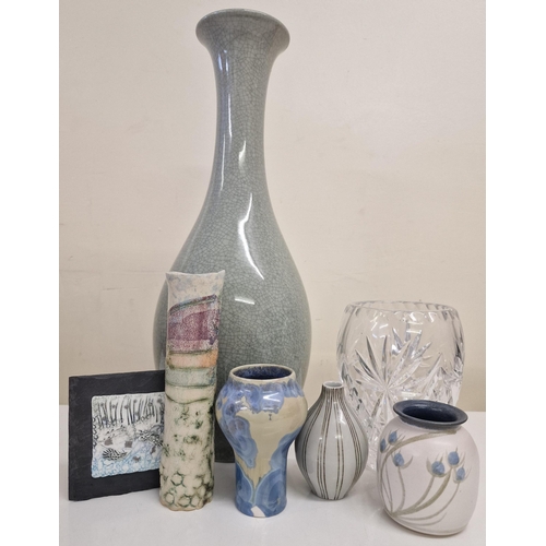 283 - A mixed lot of decorative ceramic & glass pieces. To include a variety of vases & a wall slate. Tall... 