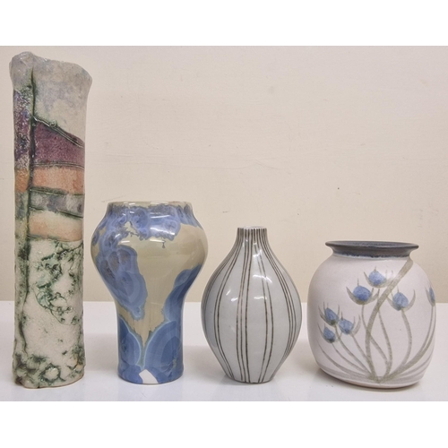 283 - A mixed lot of decorative ceramic & glass pieces. To include a variety of vases & a wall slate. Tall... 