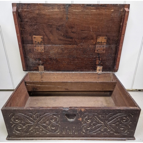 461 - A likely 18th century deed box, with intricate carving to front. Dimensions(cm) H20, W69, D43.