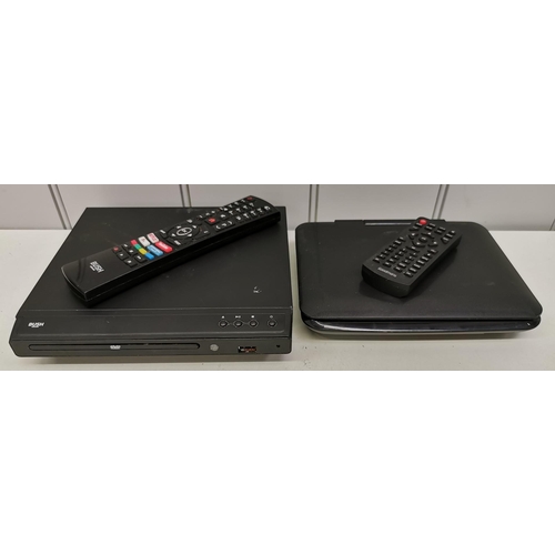 531 - A 'Bush' DVD player, together with a 'Goodmans' portable DVD player. Both complete with remote contr... 