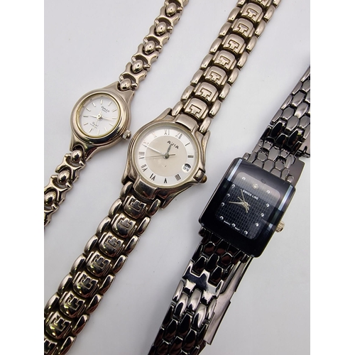 585 - A collection of four ladies watches. All battery powered. Makers include Ledfort, OMAX, Avia & Swiss... 