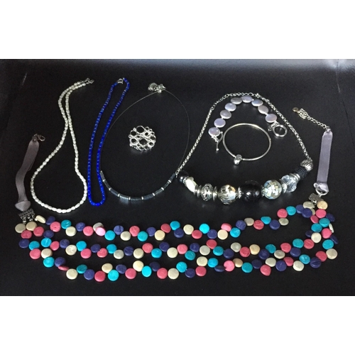 653 - A mixed collection of sterling silver & costume jewellery. To include a 'Pandora' bangle, silver bro... 