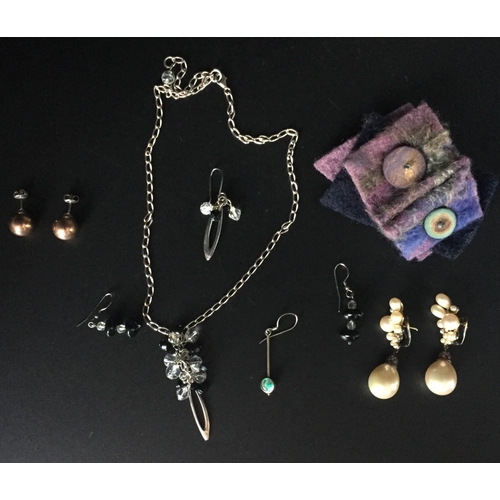 654 - A collection of silver jewellery. To include pearl earrings, necklace, brooch & other earrings (incl... 