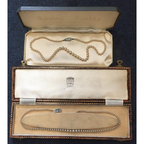 660 - Two vintage, boxed simulated pearl necklaces, by 'Lotus' & 'Rosita'.