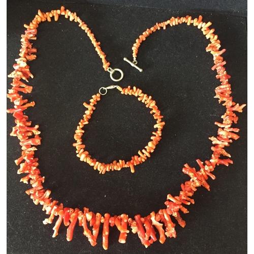 661 - A vintage Coral strand necklace & matching bracelet.