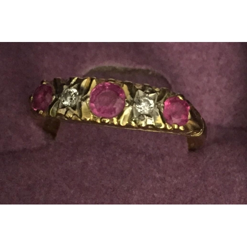 664 - An 18ct gold, five stone ruby & diamond engagement ring. Size M. Weight approx. 3.9g