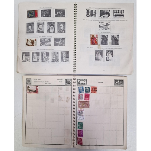 692 - A collection of four partially-filled stamp albums, containing a variety of worldwide stamps.