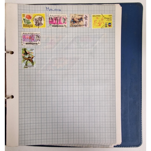 692 - A collection of four partially-filled stamp albums, containing a variety of worldwide stamps.