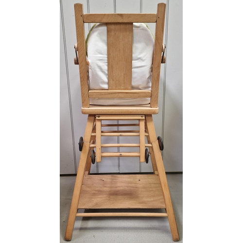 743 - A beech, doll's highchair. Dimensions(cm) H98, W51, D51.