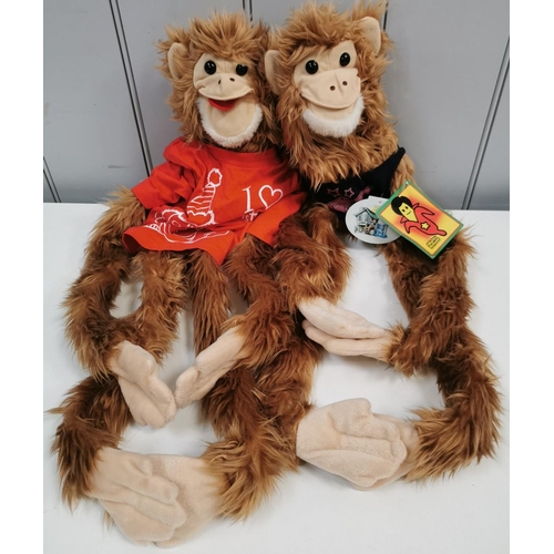 754 - A pair of monkey puppets by 'Mighty Banana'. Height 74cm.