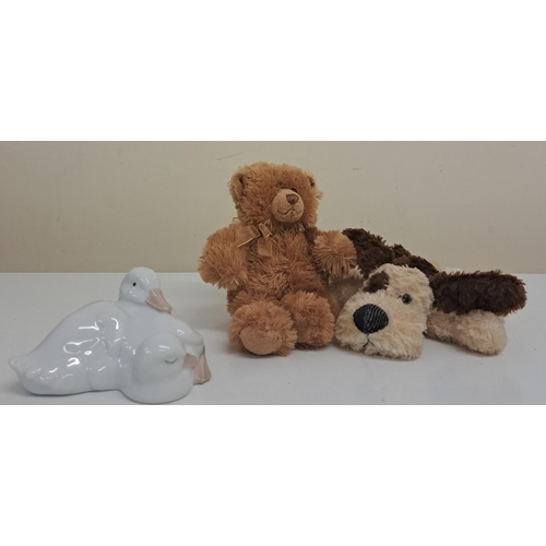 764 - A mixed lot of three collectible items. To include a 'Gund' teddy bear (height 15cm), 'Russ' dog (le... 