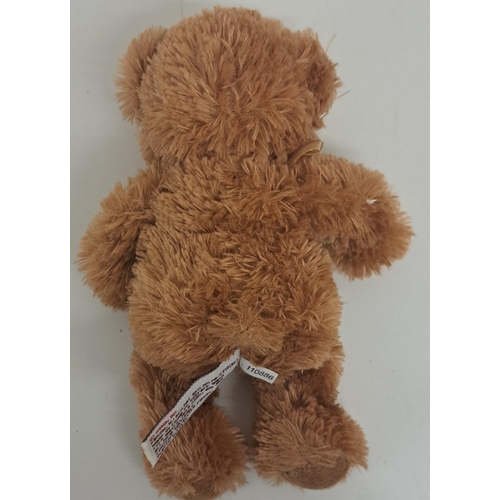 764 - A mixed lot of three collectible items. To include a 'Gund' teddy bear (height 15cm), 'Russ' dog (le... 