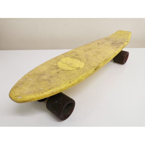 769 - A vintage 1970's, yellow 'California Spirit' 'Pennyboard' skateboard.