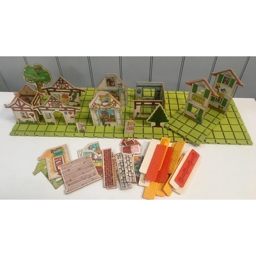 779 - A vintage, part-wooden village playset.