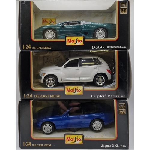 851 - A collection of three boxed Maisto 1:24 scale  boxed cars. To include 1992 Jaguar Xj220, 1996 Jaguar... 