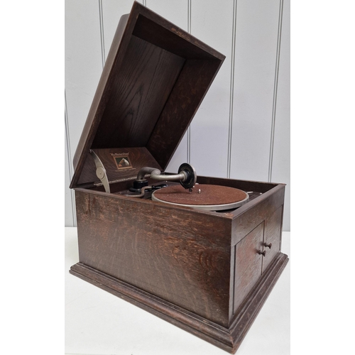 999 - An early, oak cased HMV Gramophone, complete with additional styluses.