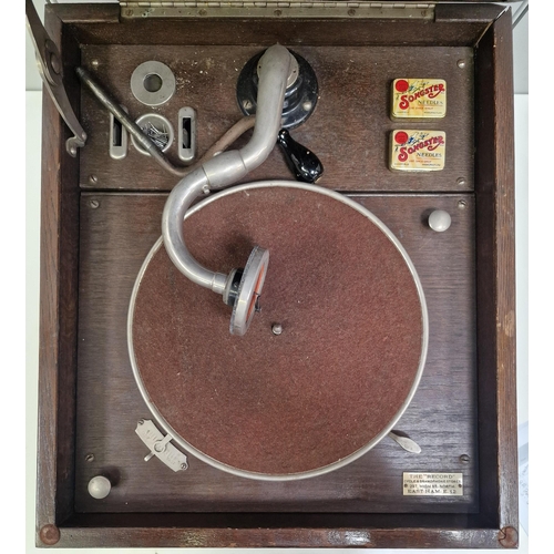 999 - An early, oak cased HMV Gramophone, complete with additional styluses.