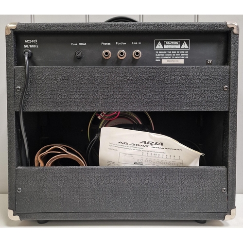 5005 - A cased Aria Pro II TA-40 hollow-body electric guitar, together with an Aria AG-30AT amplifier (PAT ... 