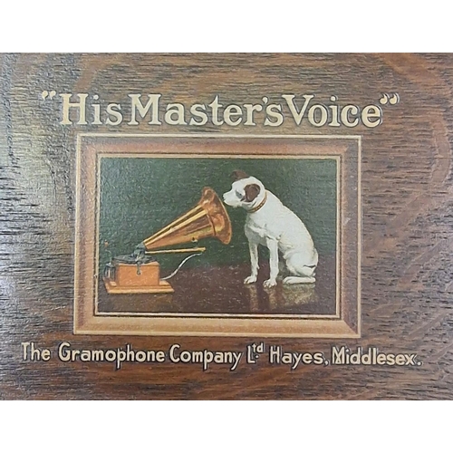 5019 - An early, oak cased HMV Gramophone, complete with additional styluses.