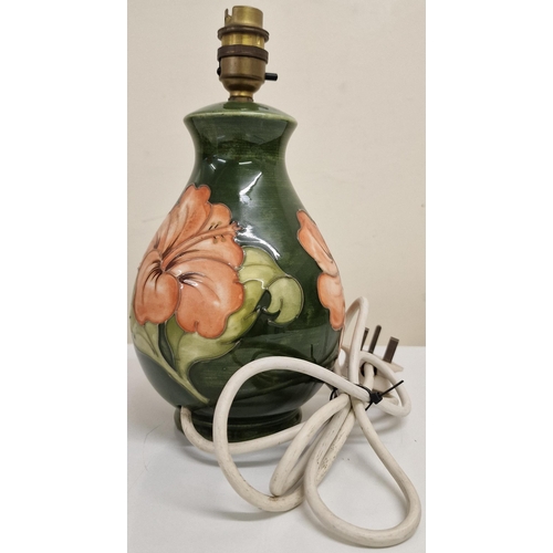 5042 - A Moorcroft Hibiscus pattern table lamp, without shade. PAT test pass & functionality test indicates... 