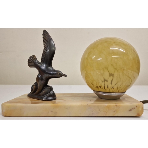 5043 - An art-deco style lamp, featuring a stylized, spelter bird figure, with a speckle-shaded lamp all mo... 