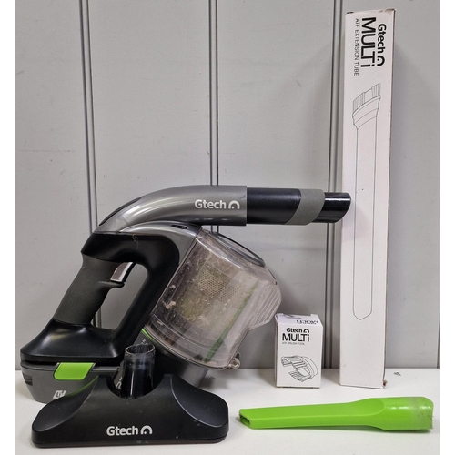 5056 - A pair of 'Gtech' rechargeable handheld vacuum cleaners. Model no's Multi ATF001 & SCV100. Complete ... 